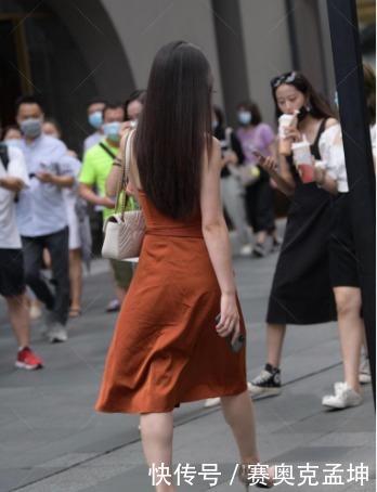 衬托|橙色开叉裙,衬托高雅气质
